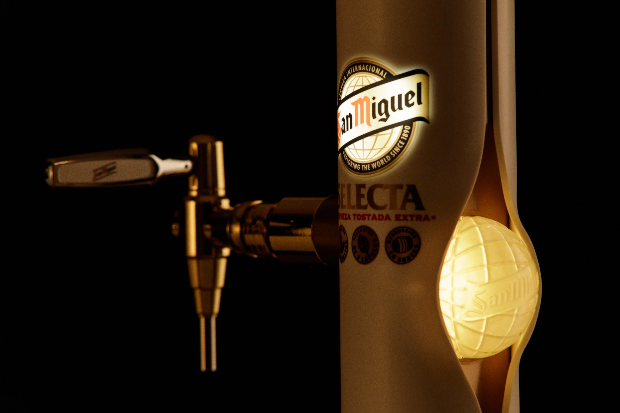 San Miguel Premium dispenser with illuminated globe detail