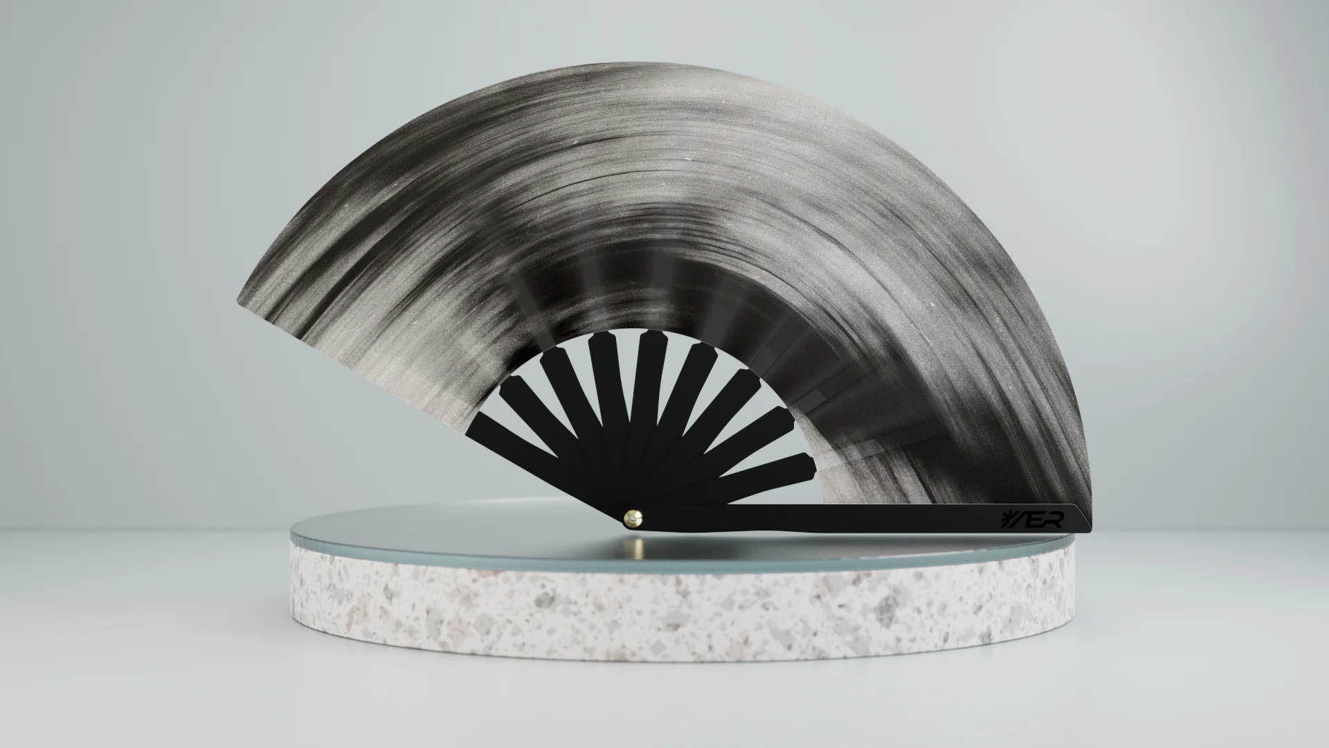 Monochrome AER hand fan representing the physical product
