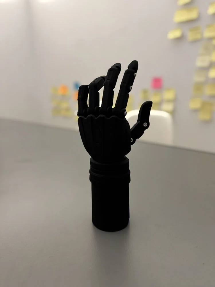 Front view of the black MJF-manufactured prosthesis